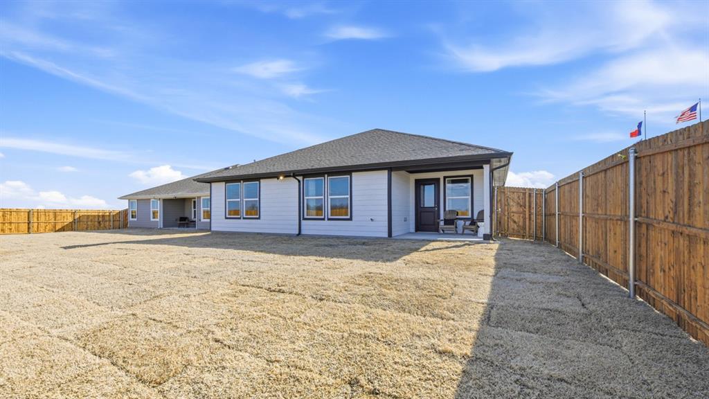 125 MLM Parkway Bridgeport, TX 76426 - Photo 34 of 35 a front view of a house with a yard