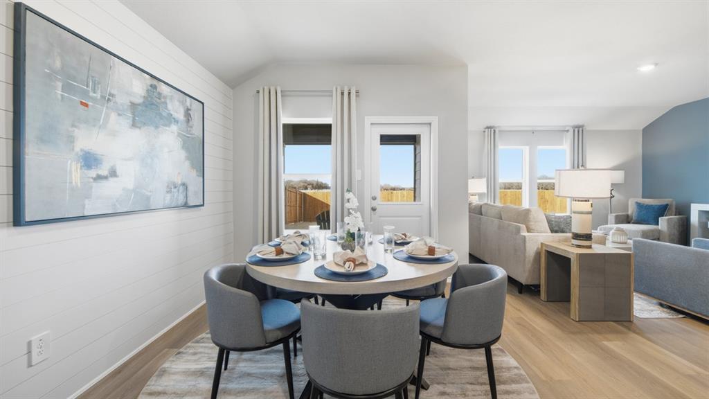 125 MLM Parkway Bridgeport, TX 76426 - Photo 5 of 35 a view of a dining room with furniture and wooden floor
