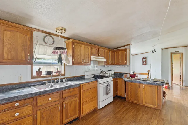 $700,000 | 21576 Patterson Road, Unit OPTION A, Tustin, MI 49688