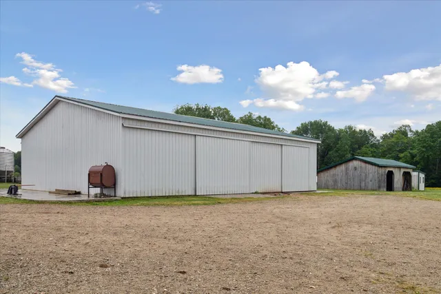 $700,000 | 21576 Patterson Road, Unit OPTION A, Tustin, MI 49688