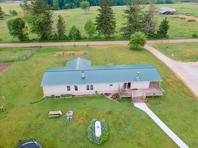 $700,000 | 21576 Patterson Road, Unit OPTION A, Tustin, MI 49688