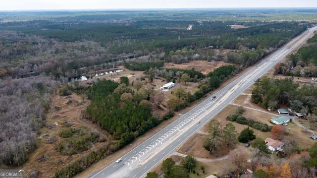 a view of a forest from a balcony