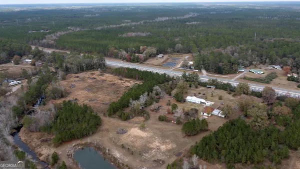 a view of a lot of trees and houses