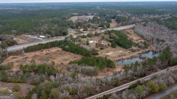 a view of a town with trees