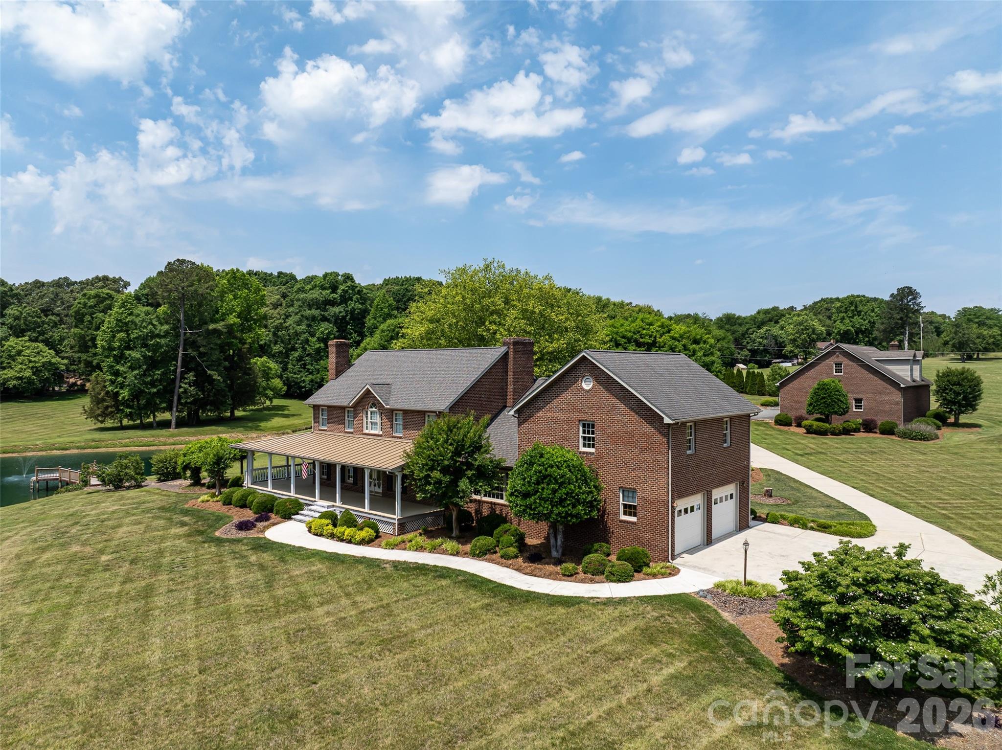40659 Ridenhour Road Richfield, NC 28137 - Photo 2 of 25 an aerial view of residential houses with outdoor space and trees