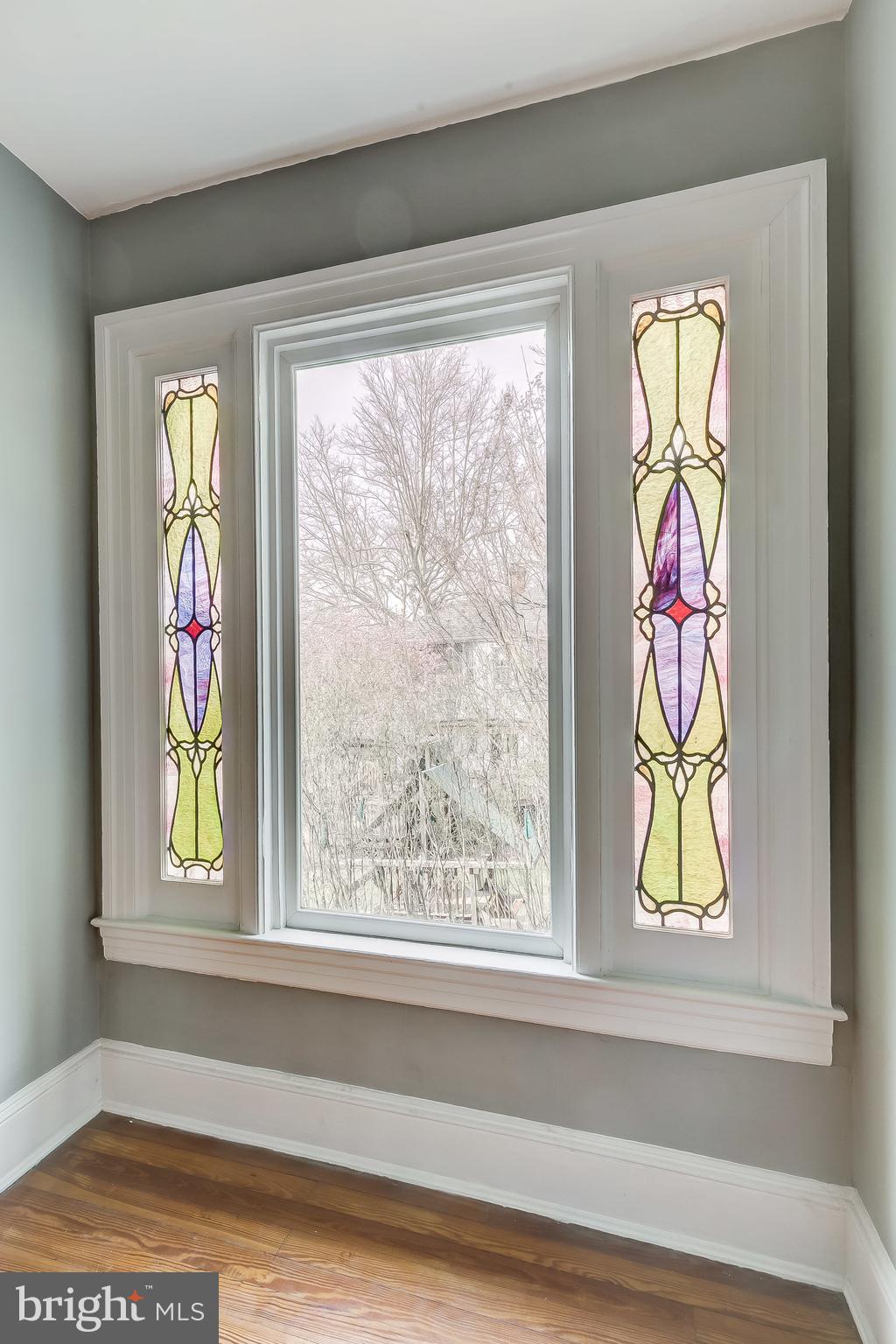 5616 Pimlico Road Baltimore, MD 21209 - Photo 33 of 66 Beautiful stained glass on landing to 2nd floor