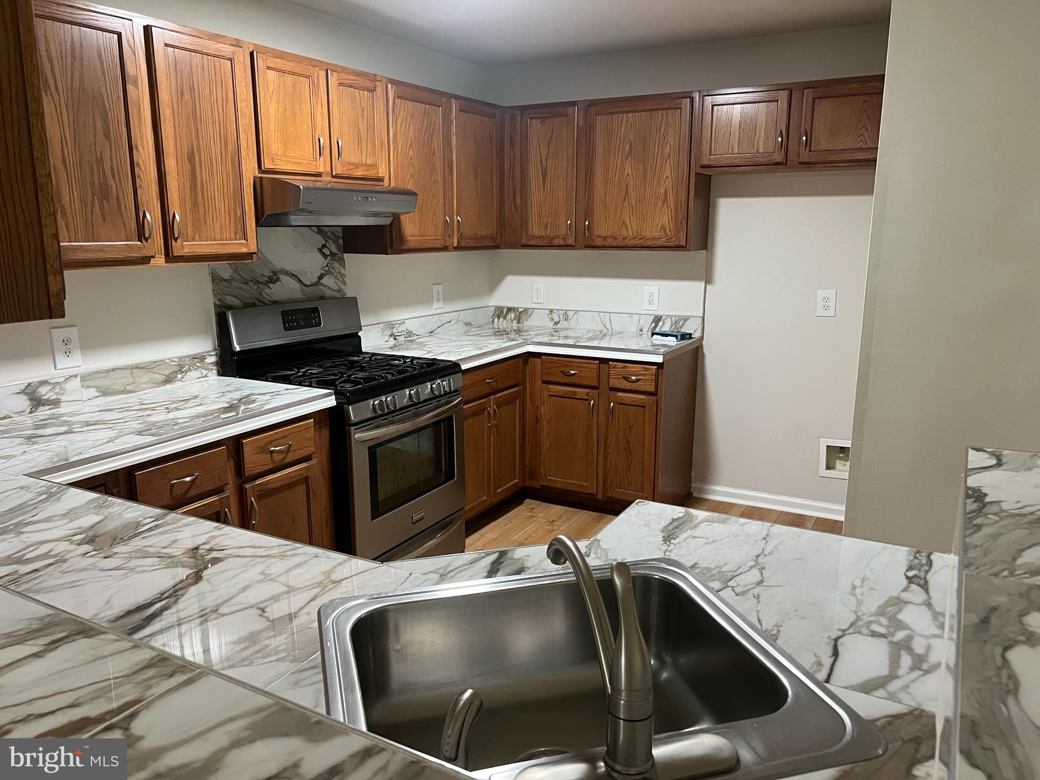 127 Natalie Road Riverside, NJ 08075 - Photo 11 of 23 New refrigerator being installed