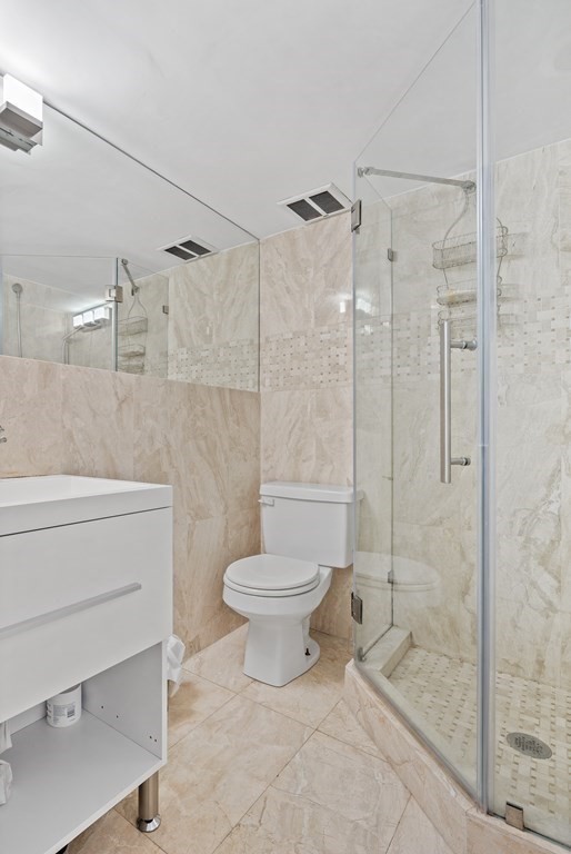 338 Beacon Street, Unit A Boston, MA 02116 - Photo 16 of 17 a bathroom with a toilet sink and shower