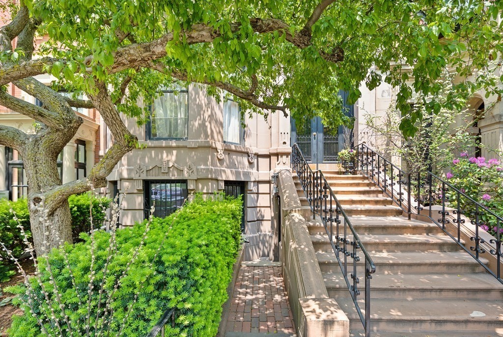 338 Beacon Street, Unit A Boston, MA 02116 - Photo 2 of 17 a front view of a house with a garden