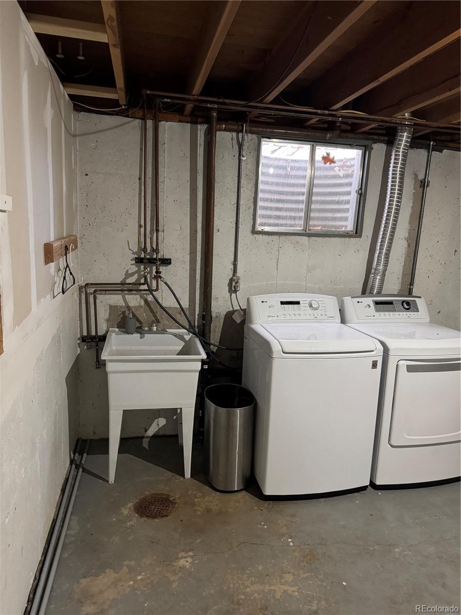 2524 South Oneida Street Denver, CO 80224 - Photo 11 of 11 a utility room with dryer and washer