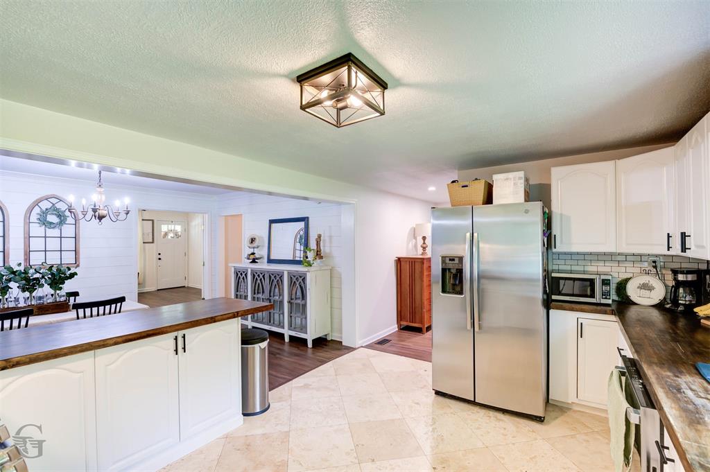 701 Chandler Road Haughton, LA 71037 - Photo 10 of 25 a kitchen with stainless steel appliances granite countertop a refrigerator and a sink