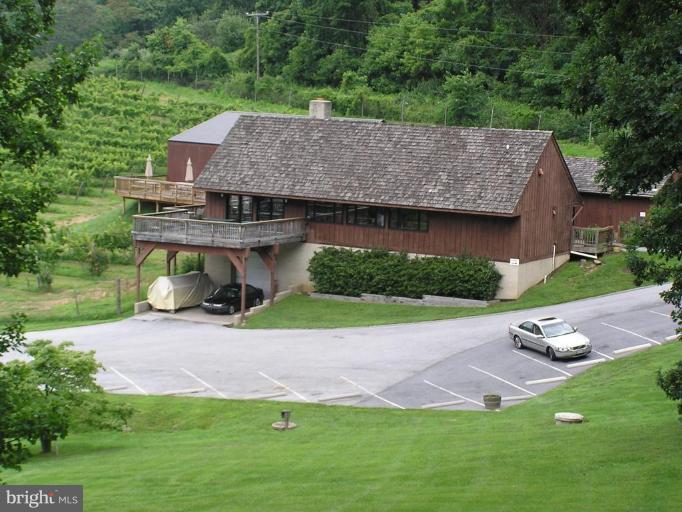 2747 Leeds Manor Road Markham, VA 22643 - Photo 3 of 5 a aerial view of a house