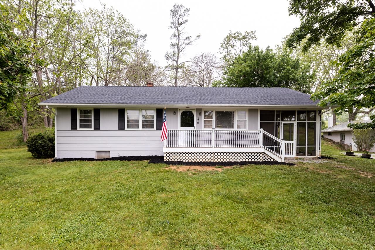 376 Kiddsville Road Fishersville, VA 22939 - Photo 1 of 31 a front view of a house with a garden