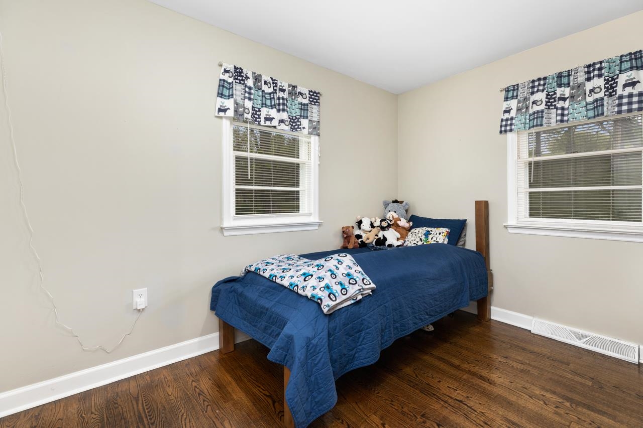 376 Kiddsville Road Fishersville, VA 22939 - Photo 16 of 31 a living room with a bed and a window