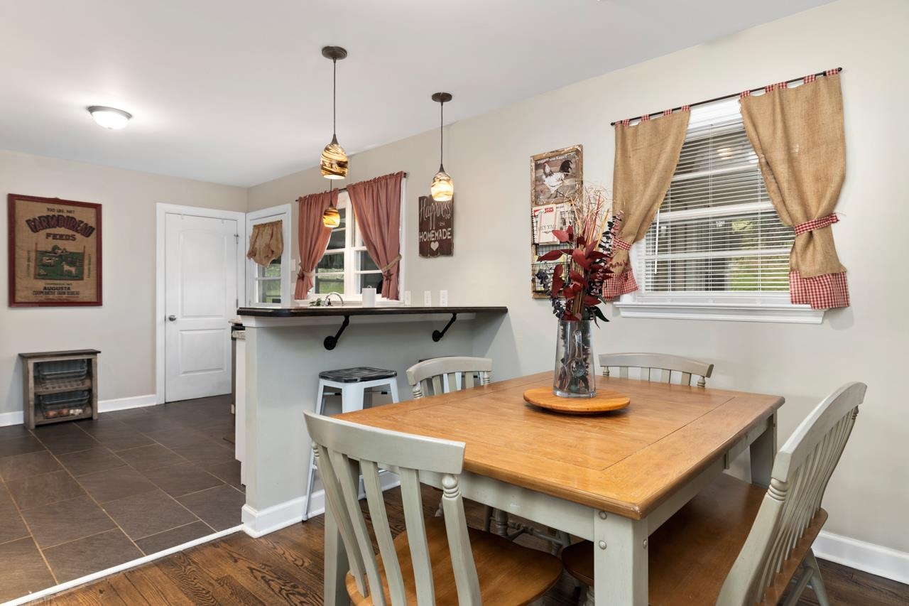 376 Kiddsville Road Fishersville, VA 22939 - Photo 3 of 31 a dining room with a table and chairs