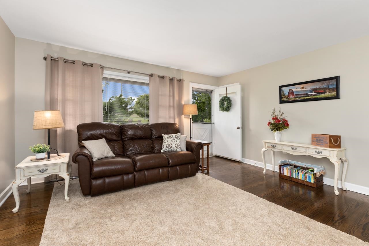 376 Kiddsville Road Fishersville, VA 22939 - Photo 4 of 31 a living room with furniture and a wooden floor
