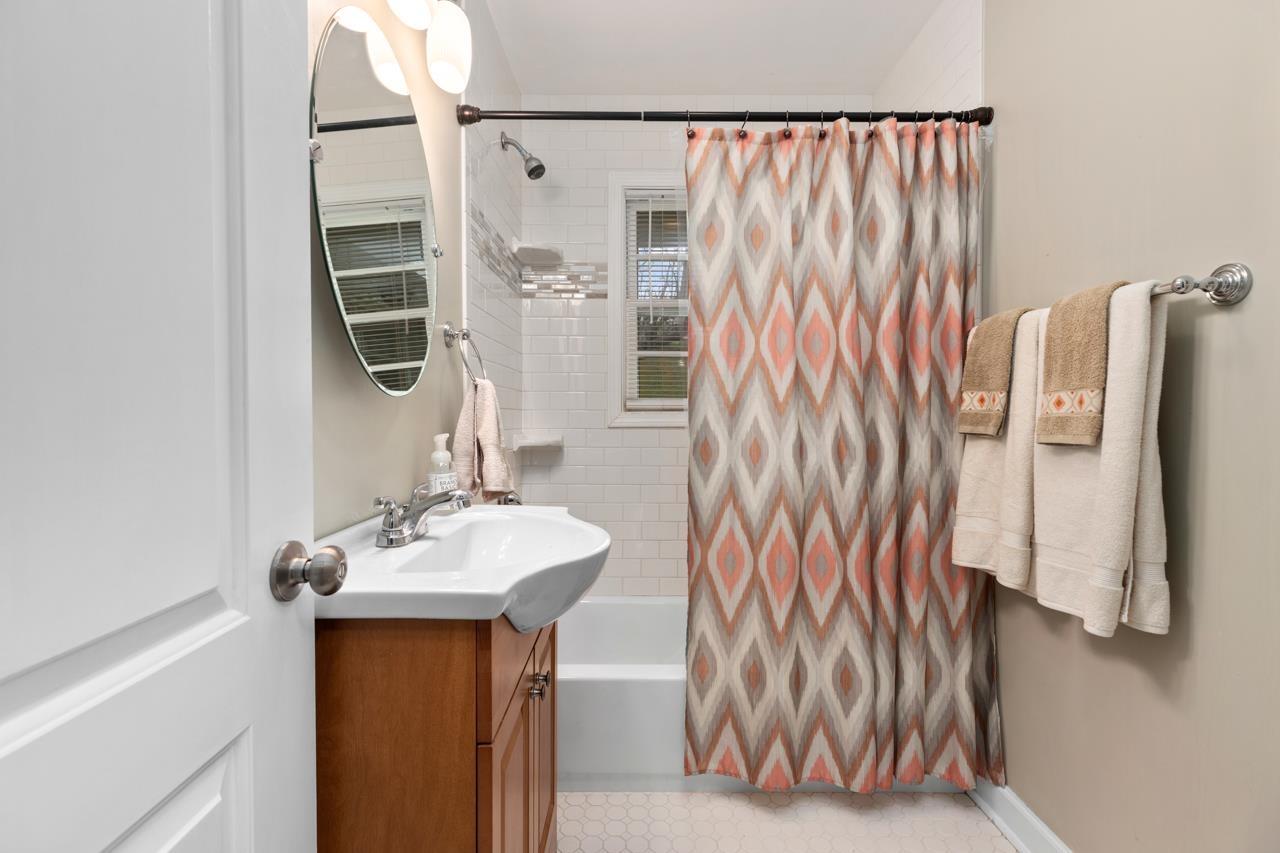 376 Kiddsville Road Fishersville, VA 22939 - Photo 6 of 31 a bathroom with a sink and a mirror