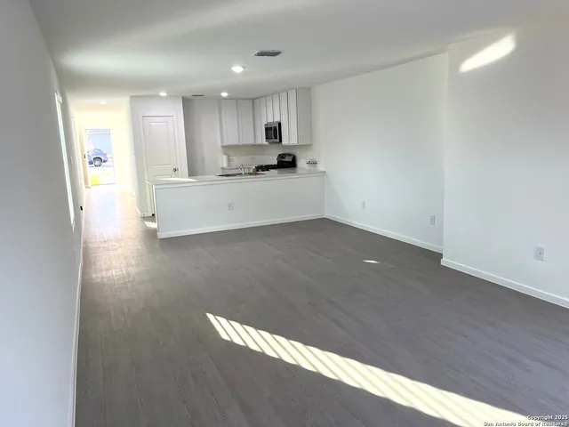 an empty room with a natural light