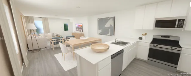 a kitchen that has a sink and a stove in it