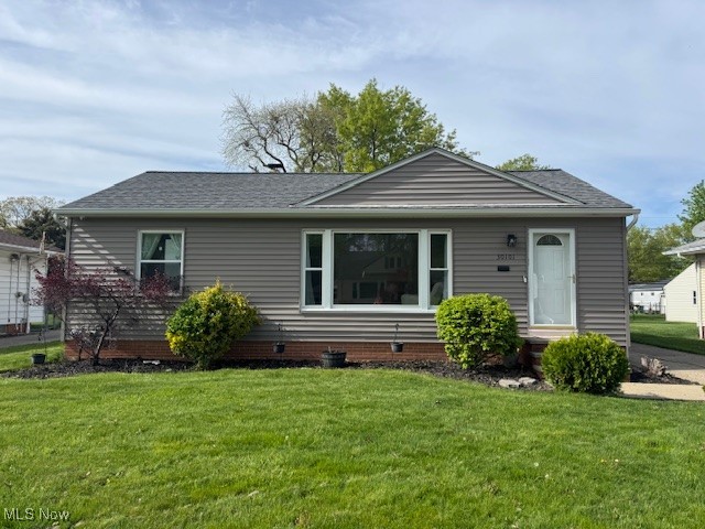 30101 Oakdale Road Willowick, OH 44095 - Photo 1 of 17 View of front of property with a front yard, roof with shingles, and crawl space