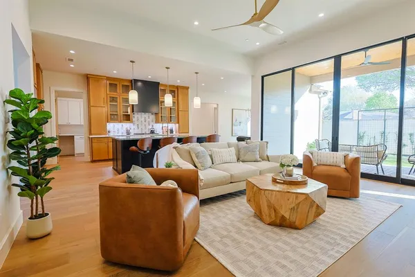 a bedroom with a bed and a couch