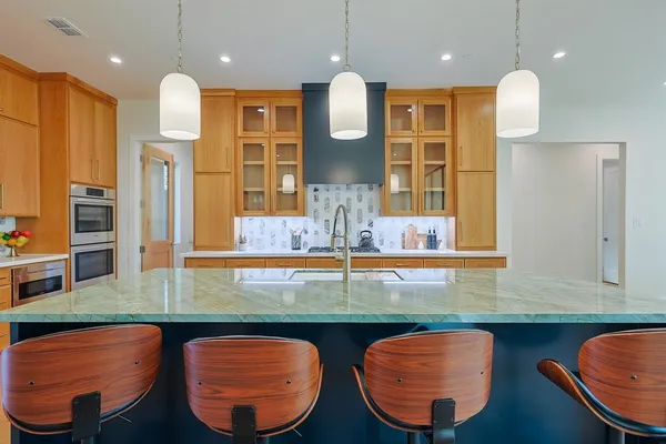 a view of a big room with windows and closet