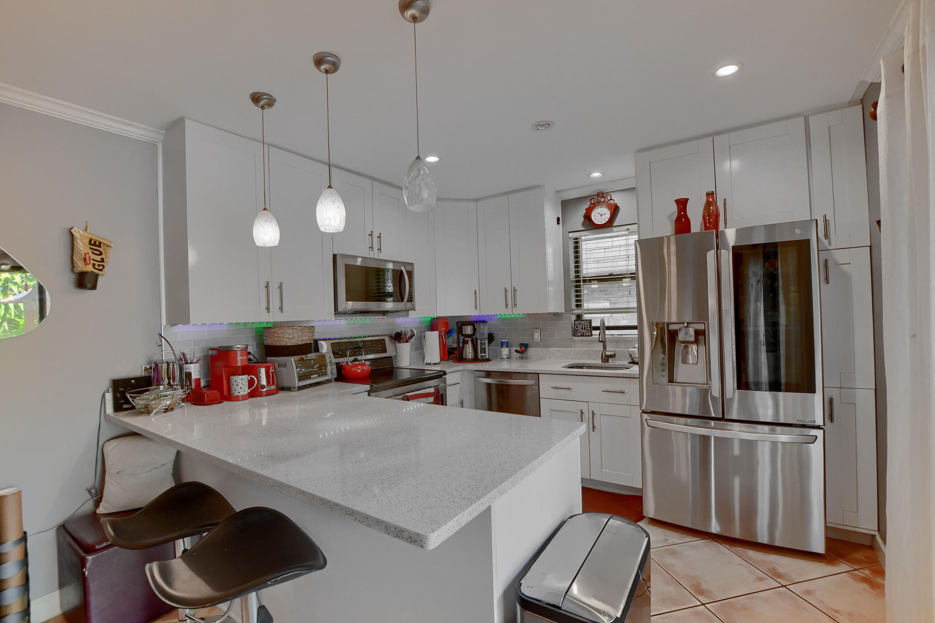7519 Courtyard Run East Boca Raton, FL 33433 - Photo 1 of 16 WOW! MODERN REMODELED KITCHEN