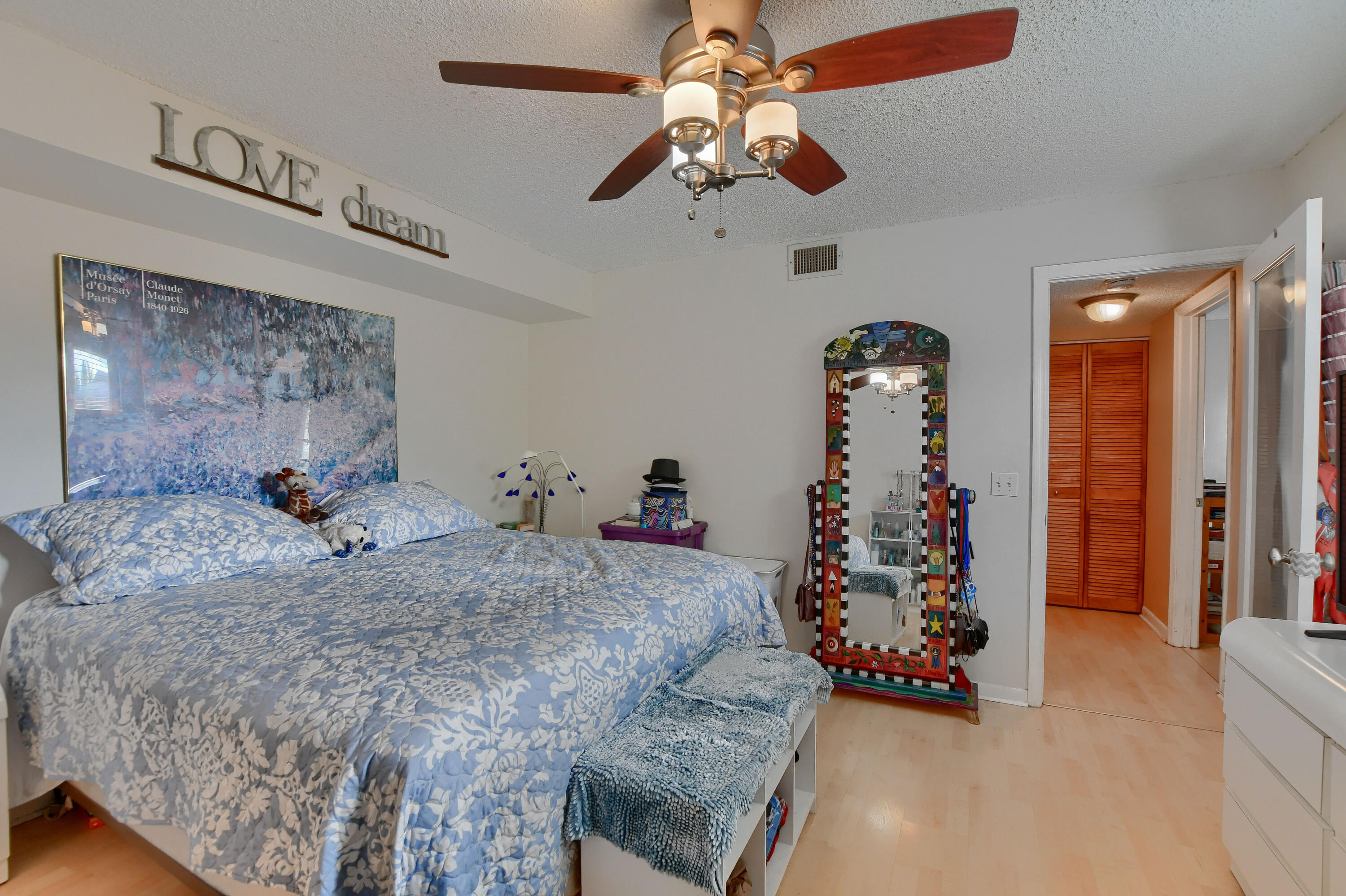7519 Courtyard Run East Boca Raton, FL 33433 - Photo 12 of 16 MASTER SUITE LAMINATE FLOORS