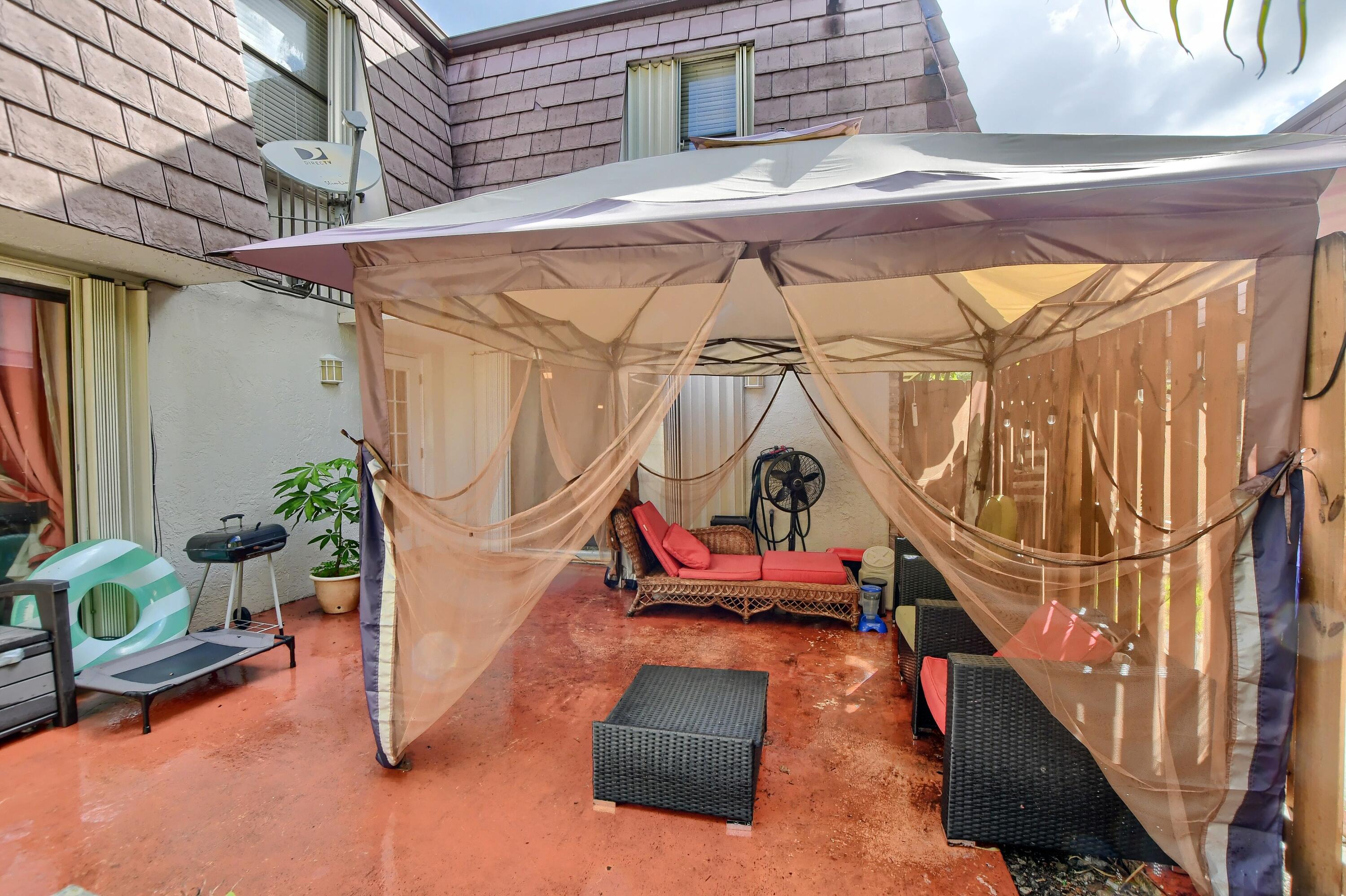 7519 Courtyard Run East Boca Raton, FL 33433 - Photo 2 of 16 HUGE PATIO WITH GAZEBO