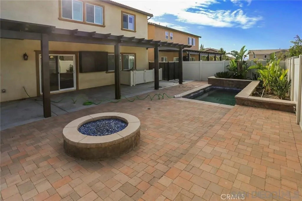 3326 Crowfoot Road San Bernardino, CA 92407 - Photo 1 of 14 View of area of fire pit and pool from the BBQ Island.