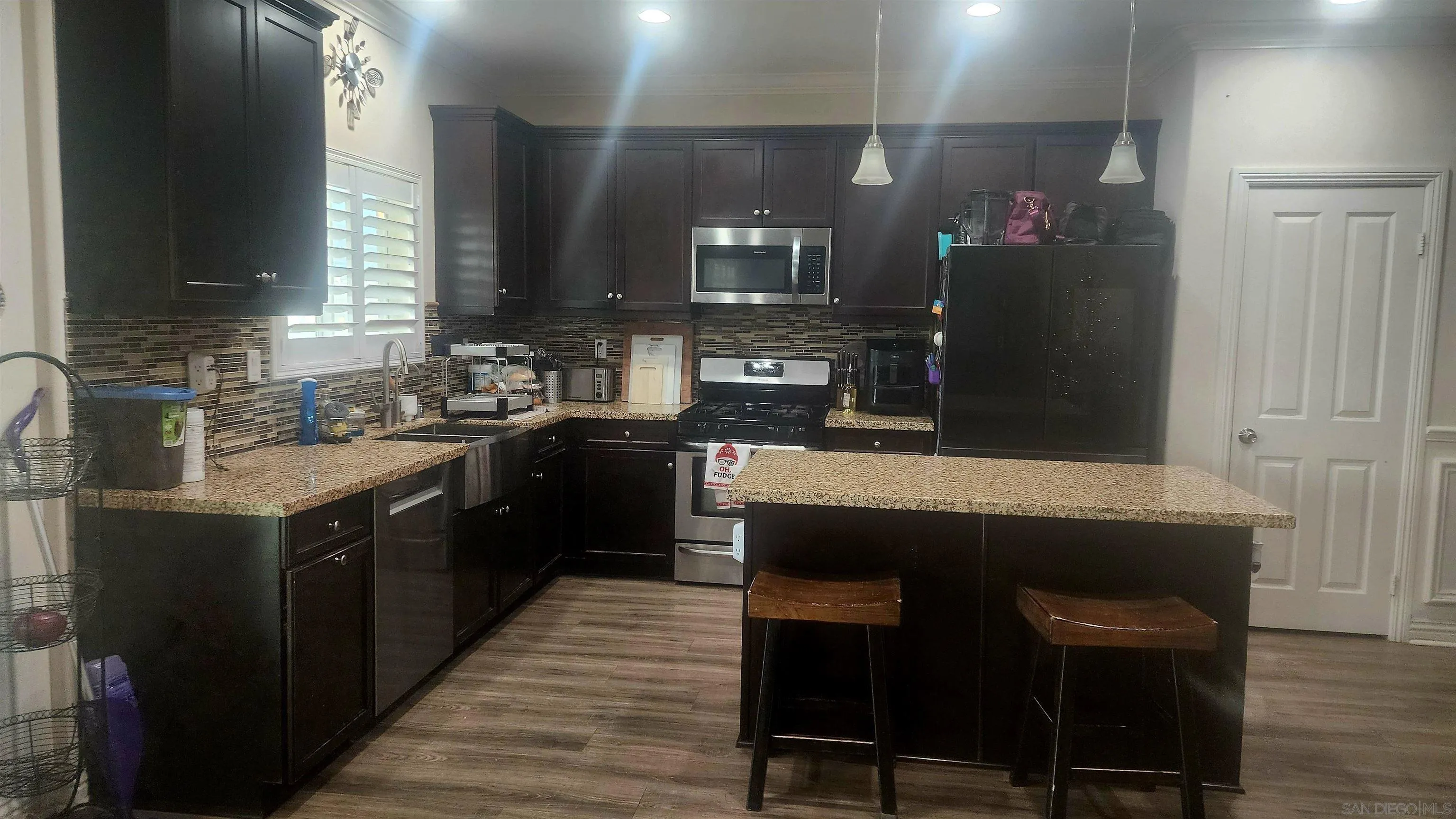3326 Crowfoot Road San Bernardino, CA 92407 - Photo 4 of 14 Enjoy granite countertops and island. Perfect for entertaining family and friends.