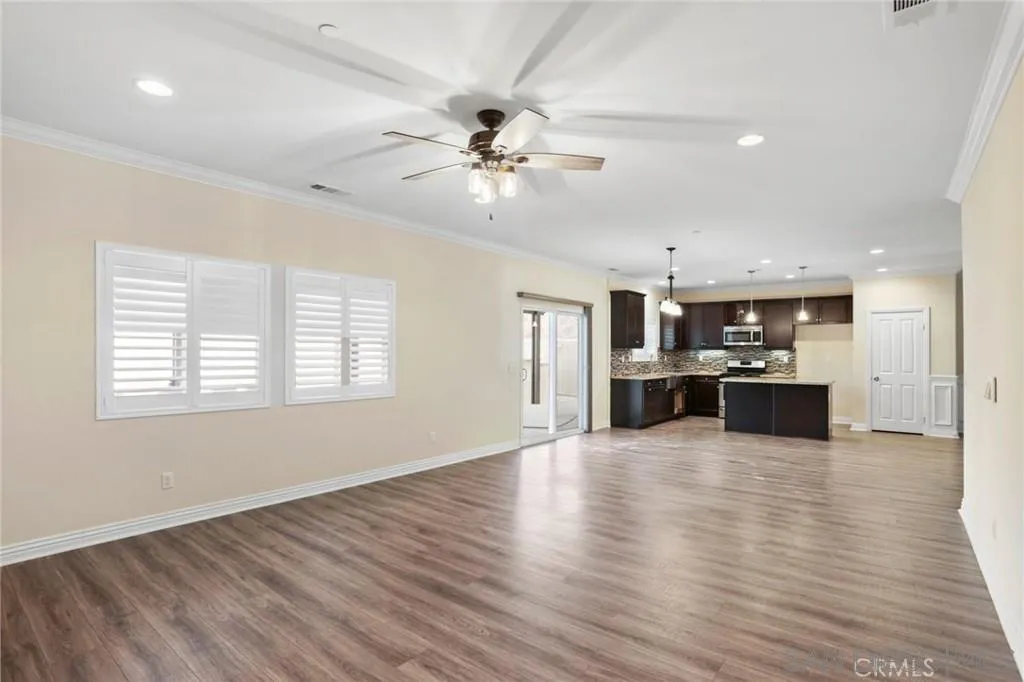 3326 Crowfoot Road San Bernardino, CA 92407 - Photo 7 of 14 Living room withlots of natural light and quick access to the back yard.