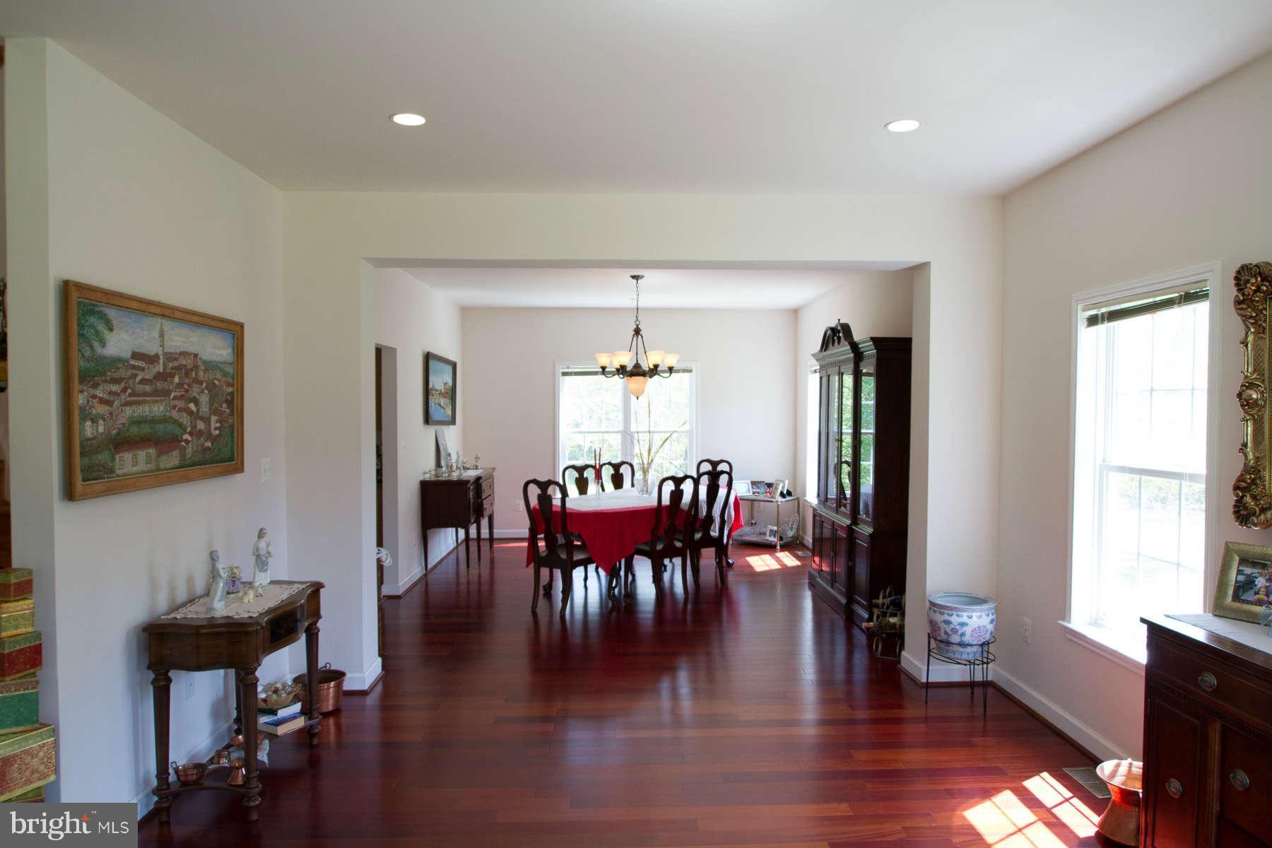 13609 Layhill Road Silver Spring, MD 20906 - Photo 11 of 30 a dining room with furniture window wooden floor
