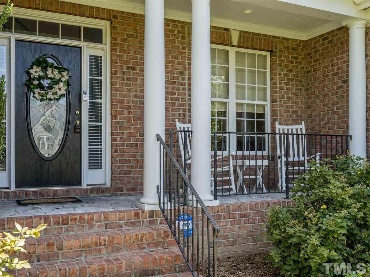 1025 Grissom Farm Road Garner, NC 27529 - Photo 2 of 30 The rocking chair front porch is the perfect place to welcome guests to your home.