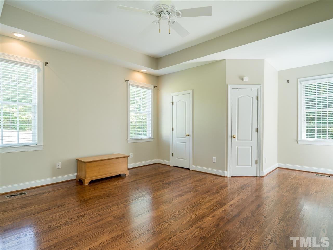 1025 Grissom Farm Road Garner, NC 27529 - Photo 15 of 30 The master suite is located on the first floor. There are two walk-in closets to enjoy.