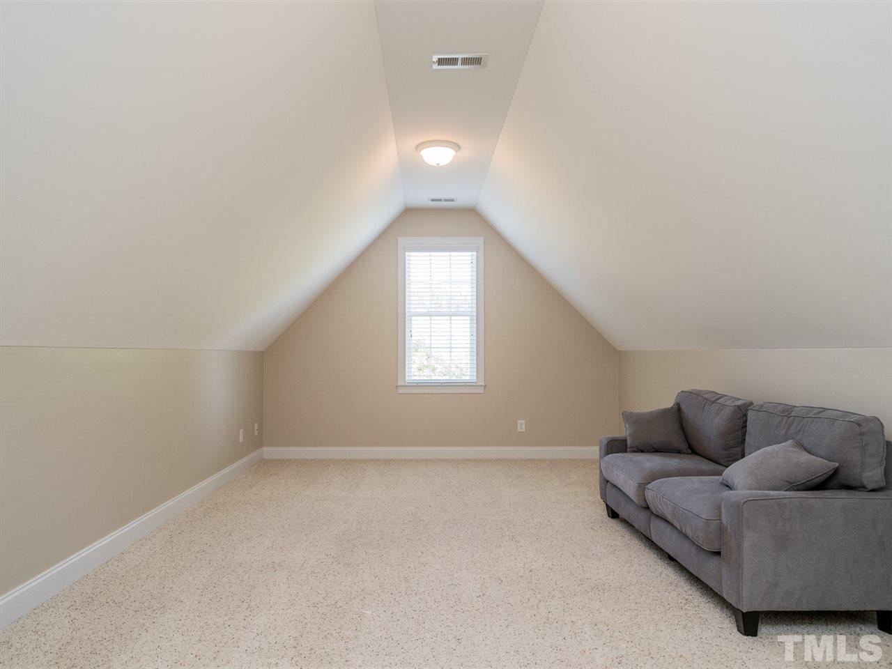 1025 Grissom Farm Road Garner, NC 27529 - Photo 22 of 30 The bonus room has lots of potential. Man cave, she shed, exercise studio, play room ... it's all up to you!