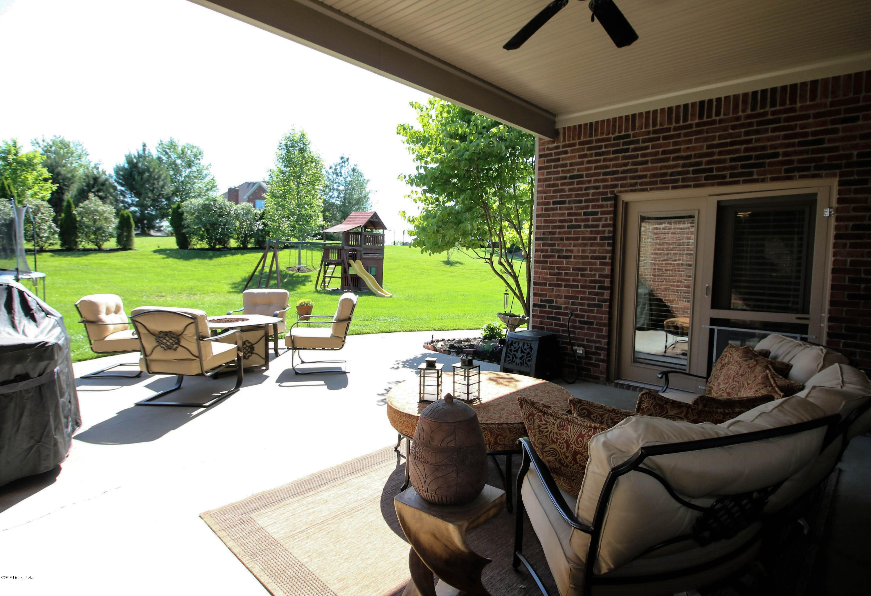 2904 Doe Ridge Court Prospect, KY 40059 - Photo 73 of 86 Enjoy the serene outdoor space from your covered patio, accessed from both the master suite and the kitchen.