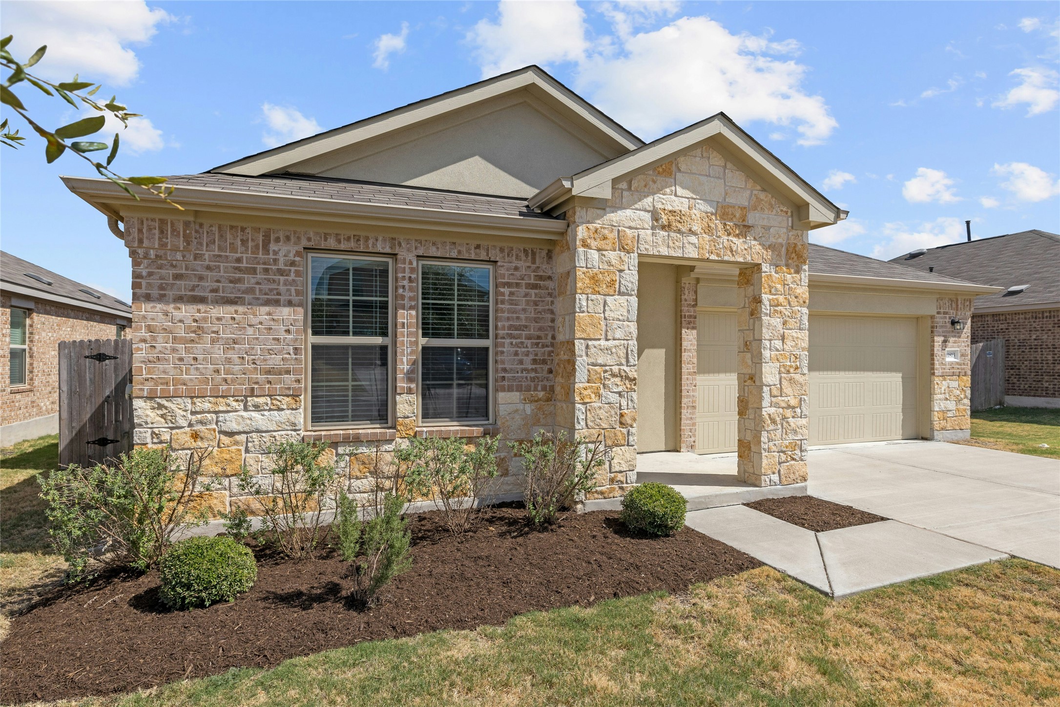 11813 Roscommon Trail Austin, TX 78754 - Photo 18 of 28 front view of a house with a yard