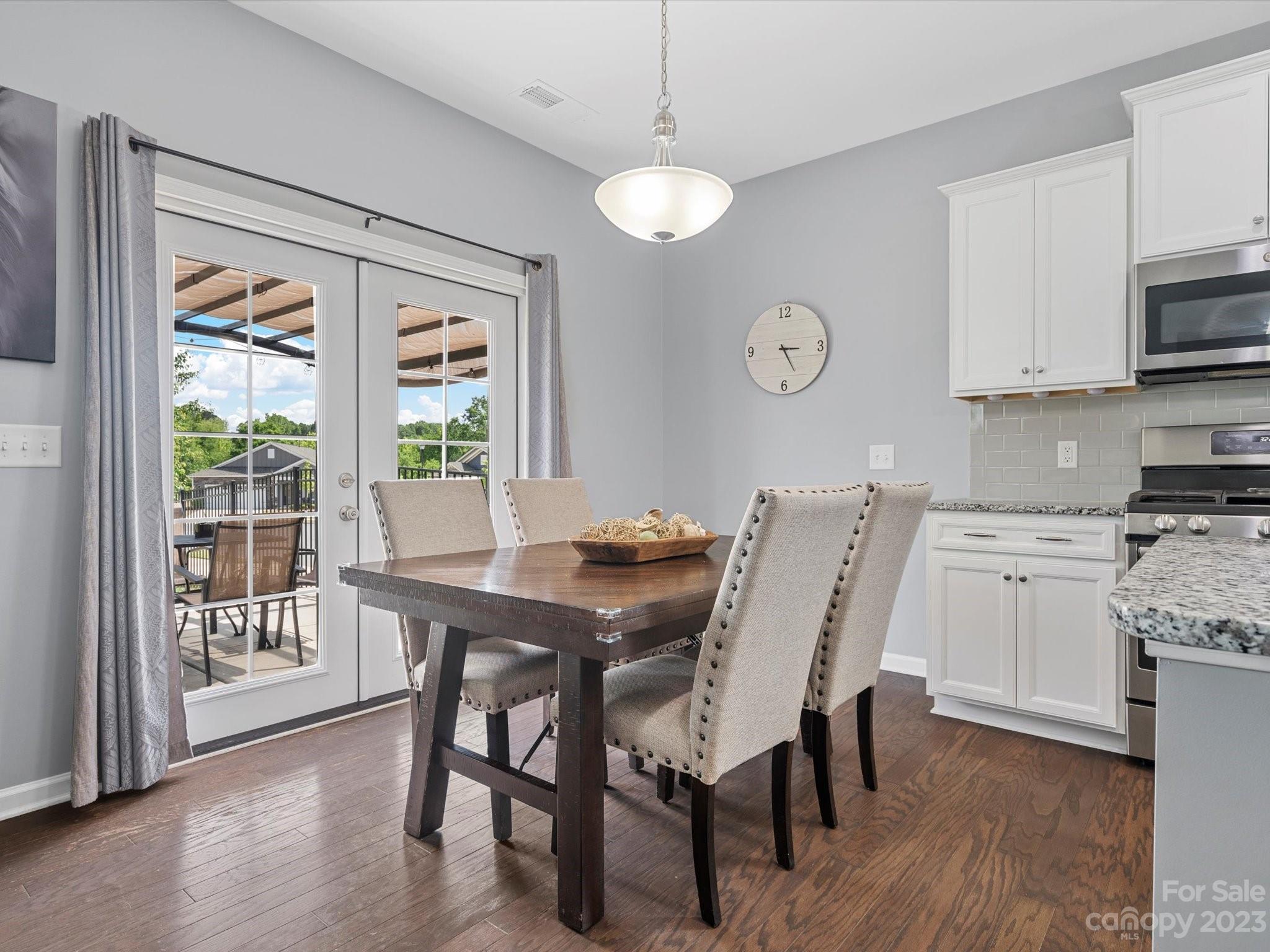 3187 Bridgewater Street Lancaster, SC 29720 - Photo 17 of 37 a view of a dining room with furniture window and wooden floor