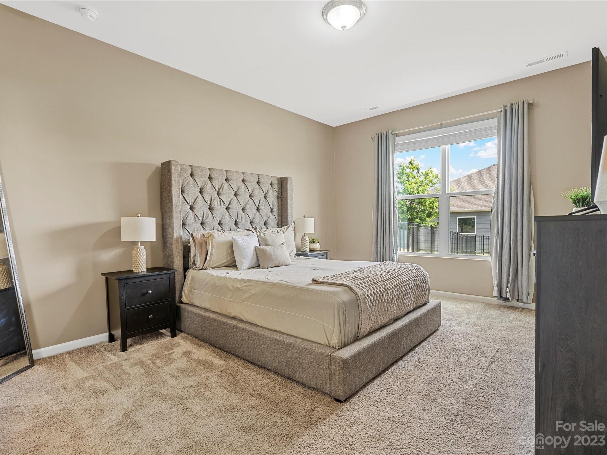 3187 Bridgewater Street Lancaster, SC 29720 - Photo 21 of 37 a bedroom with a bed and window