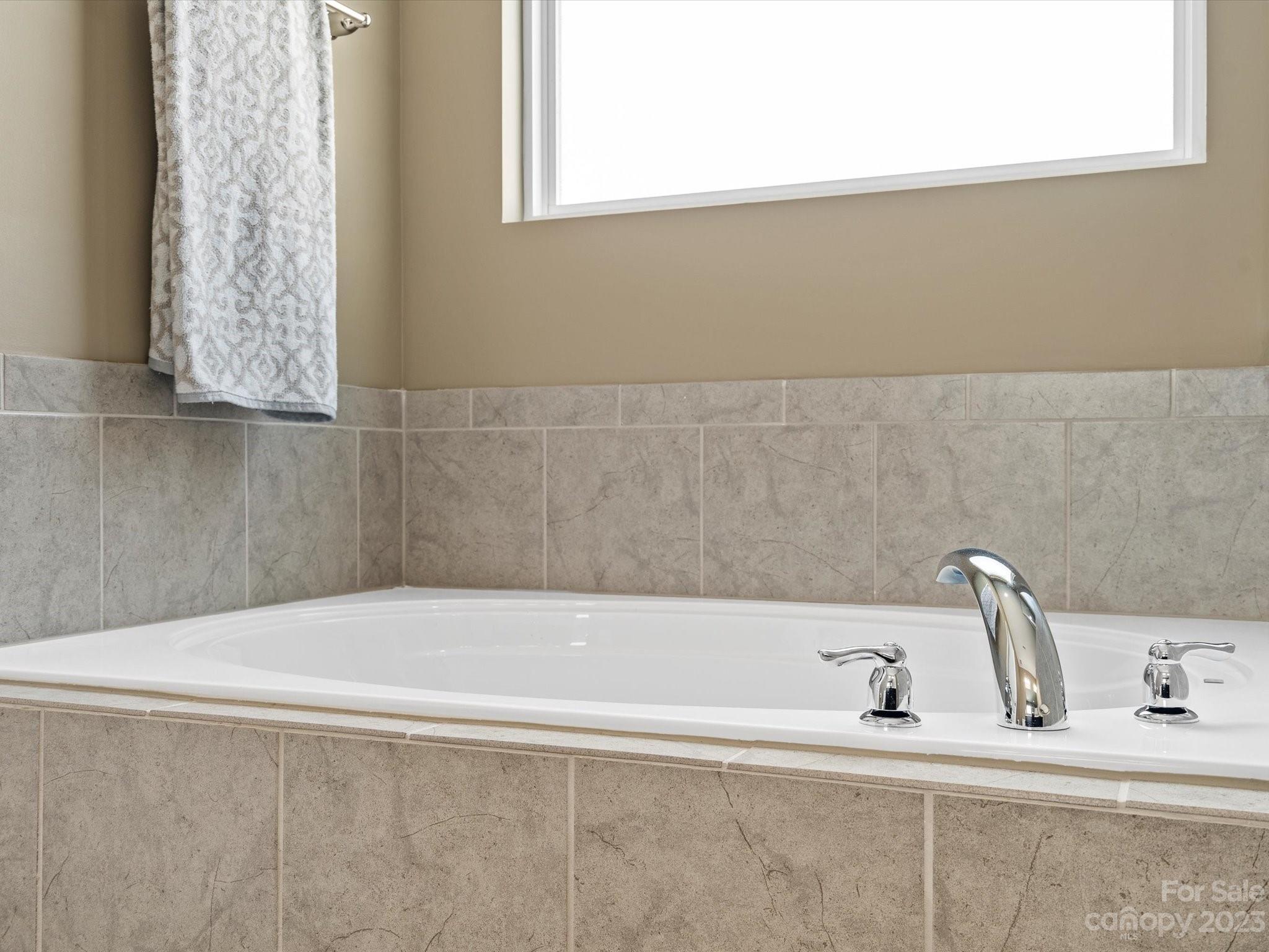 3187 Bridgewater Street Lancaster, SC 29720 - Photo 25 of 37 a bathroom with a sink and a bathtub