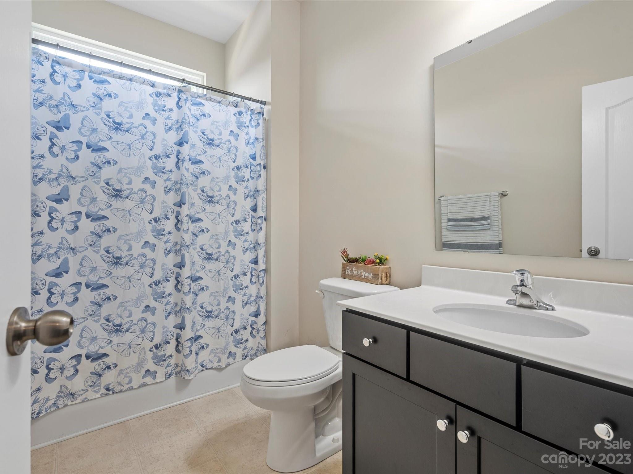 3187 Bridgewater Street Lancaster, SC 29720 - Photo 27 of 37 a bathroom with a sink toilet and shower