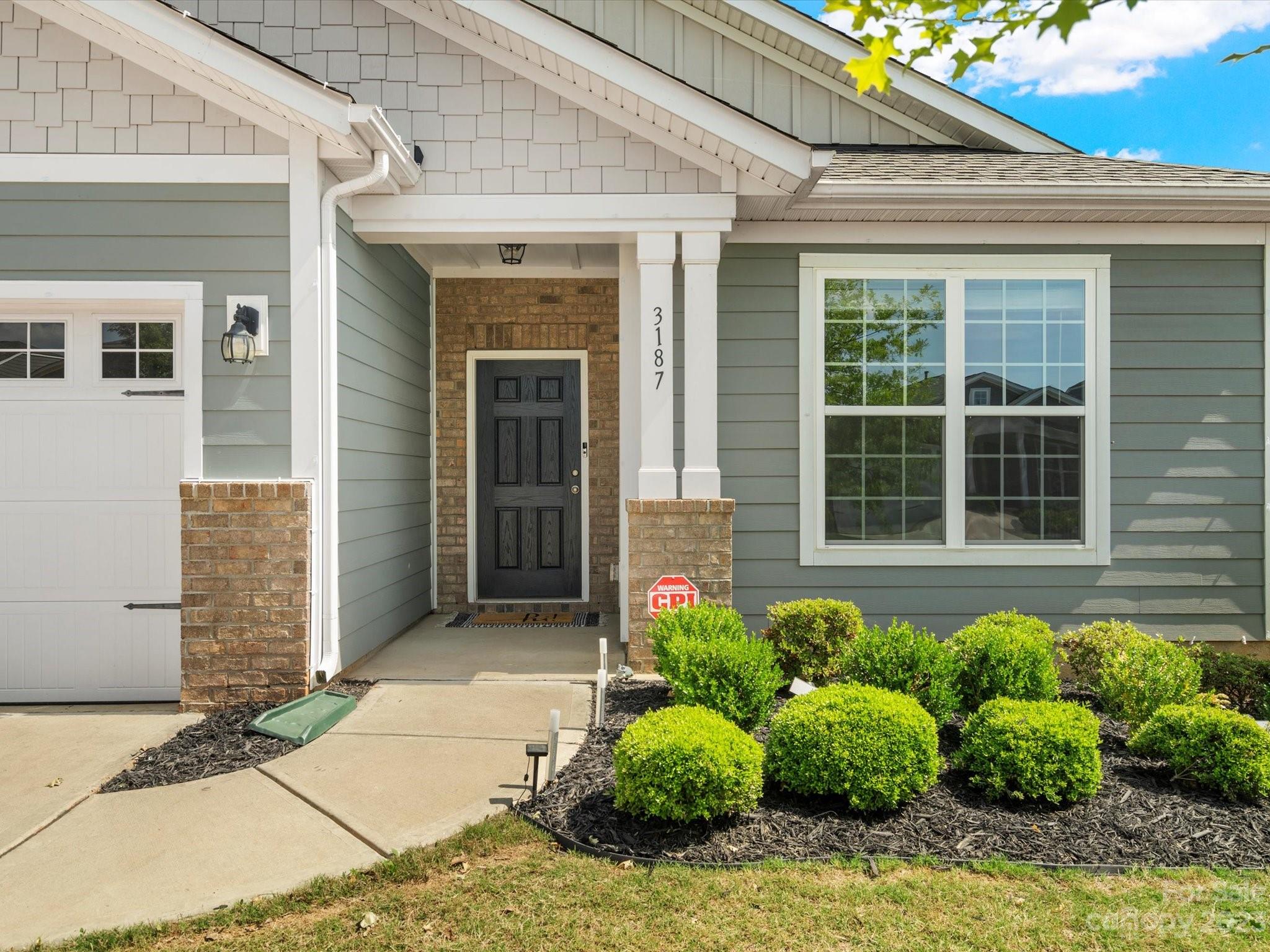 3187 Bridgewater Street Lancaster, SC 29720 - Photo 3 of 37 a front view of a house with plants