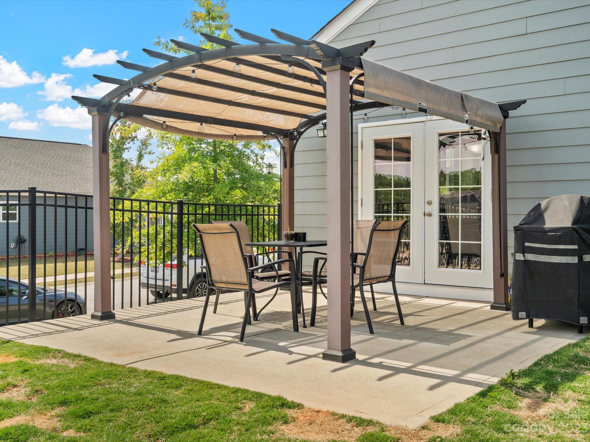 3187 Bridgewater Street Lancaster, SC 29720 - Photo 33 of 37 a patio with a table and chairs
