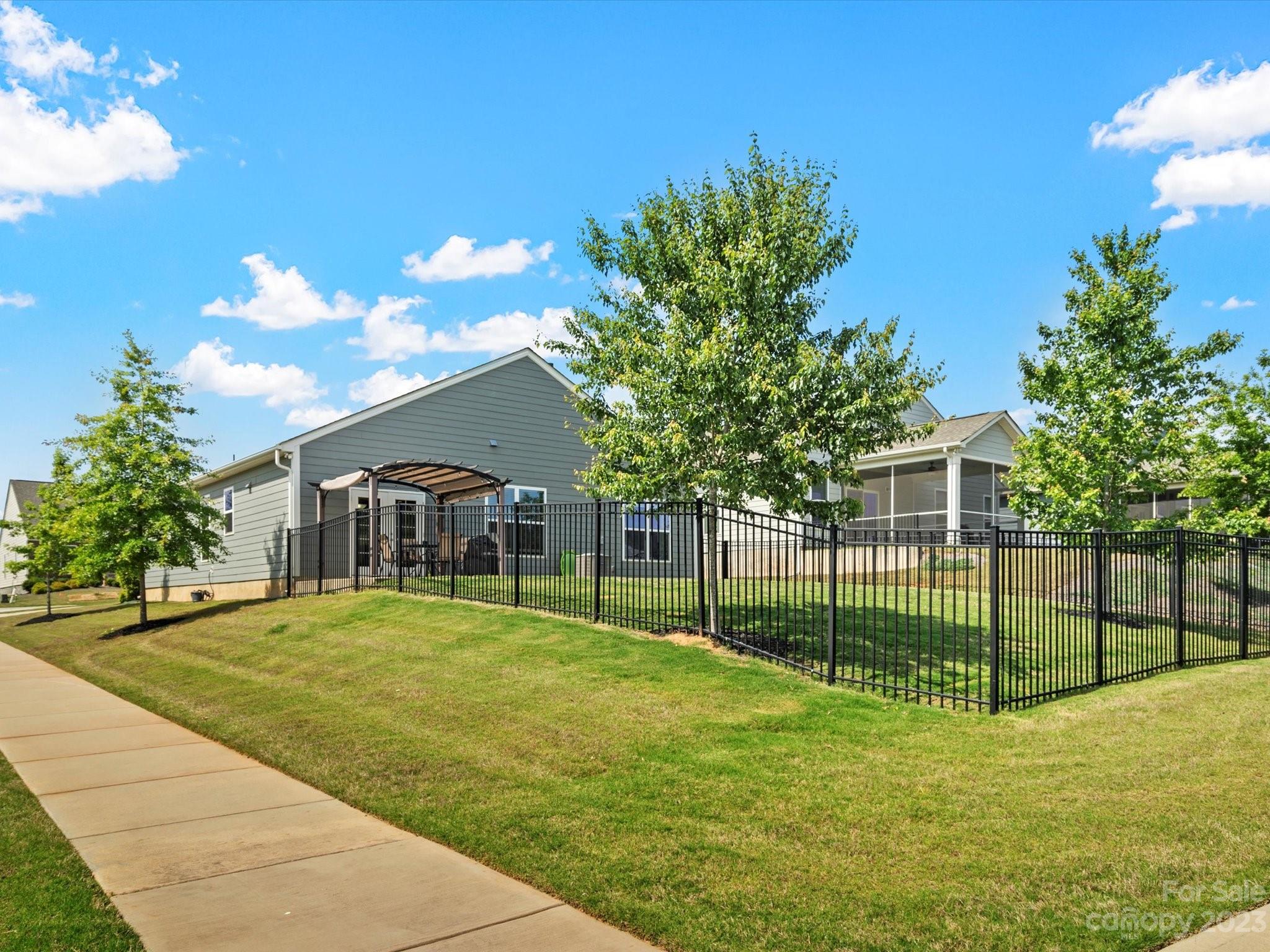 3187 Bridgewater Street Lancaster, SC 29720 - Photo 37 of 37 a view of a house with a backyard and a tree