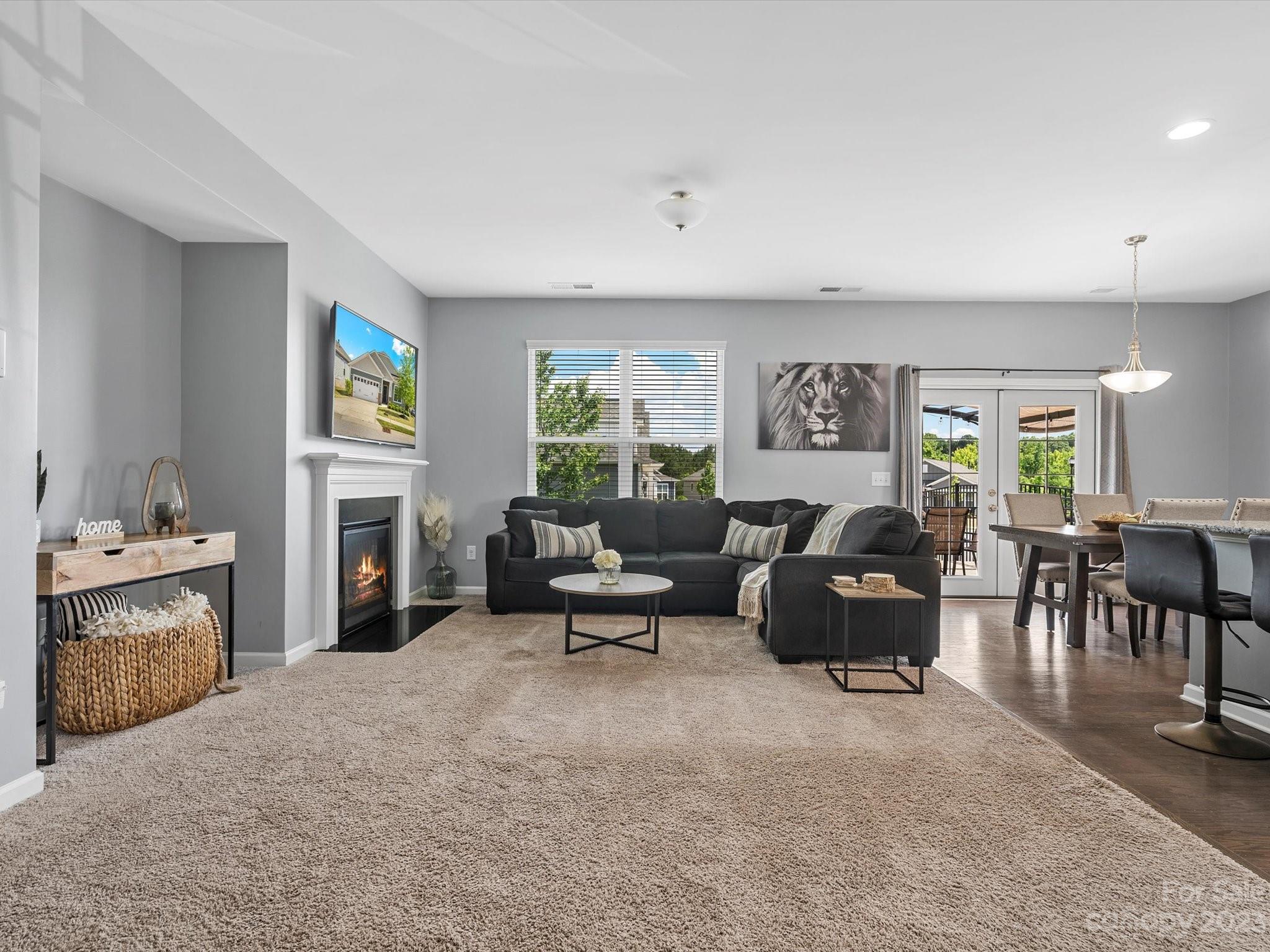 3187 Bridgewater Street Lancaster, SC 29720 - Photo 6 of 37 a living room with furniture and a fireplace