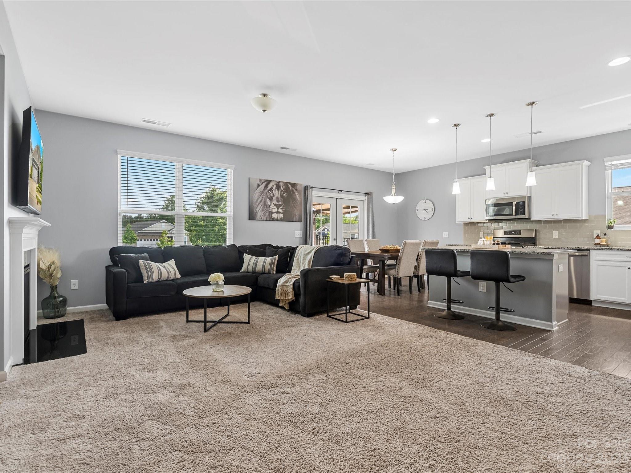 3187 Bridgewater Street Lancaster, SC 29720 - Photo 7 of 37 a living room with furniture and a large window