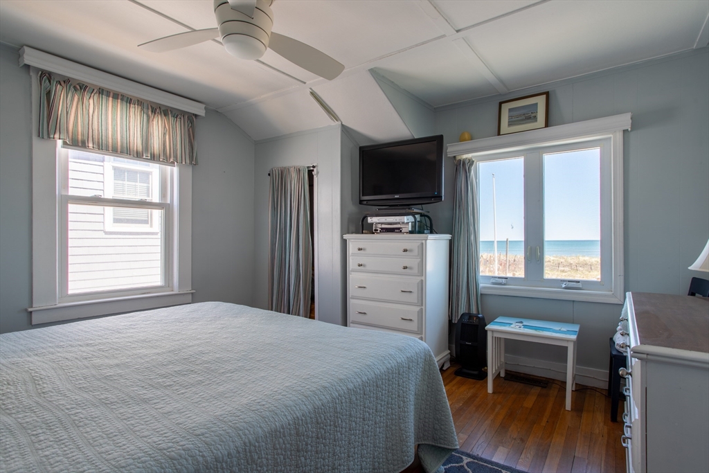 29 Commonwealth Avenue Salisbury, MA 01952 - Photo 4 of 34 a bedroom with a bed and a television
