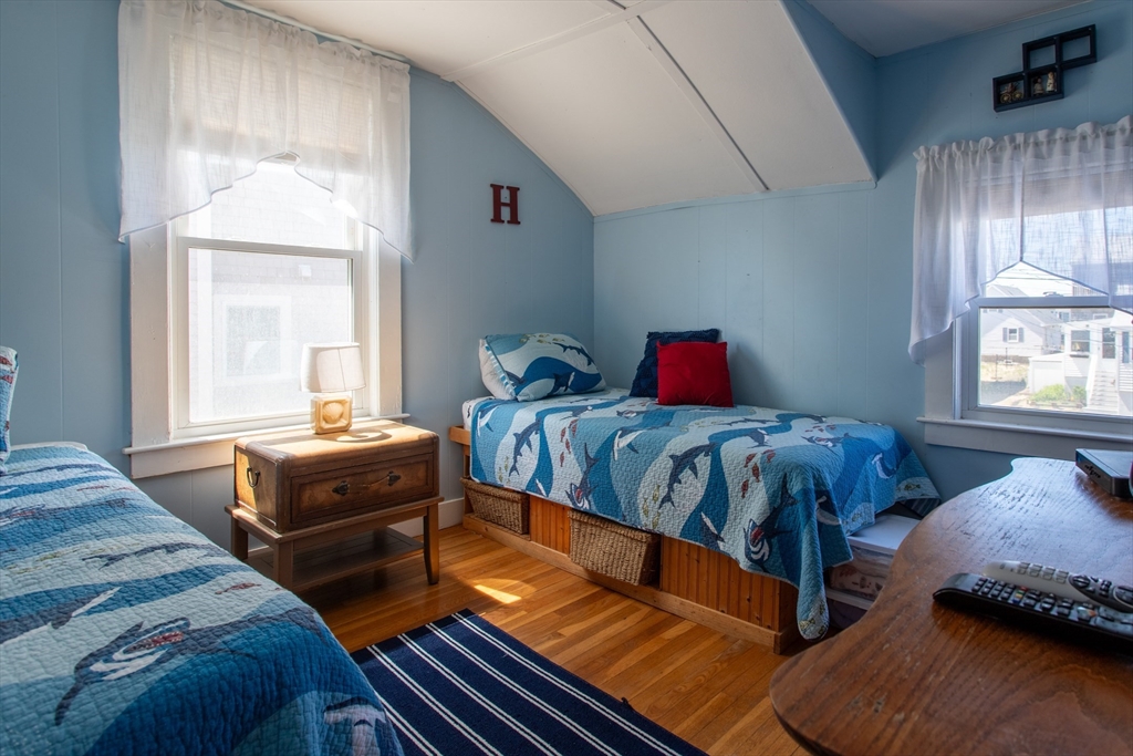 29 Commonwealth Avenue Salisbury, MA 01952 - Photo 6 of 34 a bedroom with two beds and a window