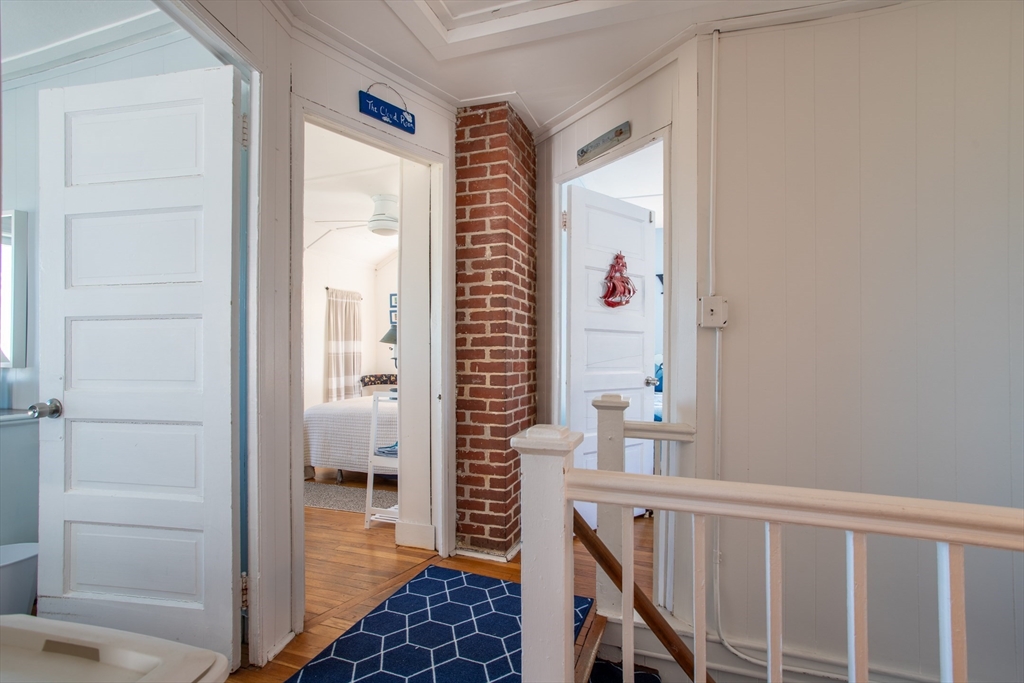 29 Commonwealth Avenue Salisbury, MA 01952 - Photo 9 of 34 a view of a hallway with wooden floor and entryway